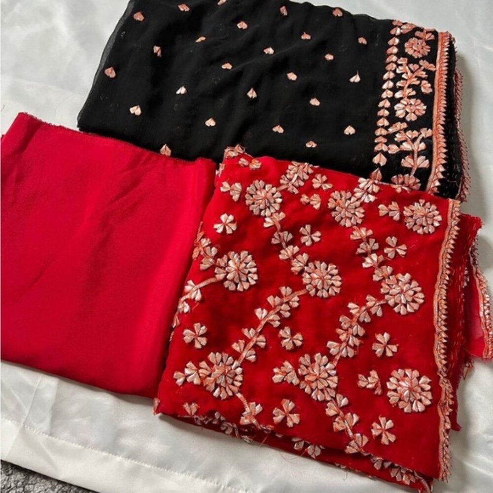 New pakistani suit un used with beautiful colour black and red